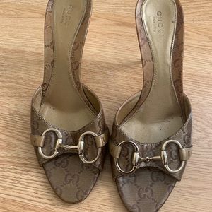 Gucci mules with small gold stiletto heel